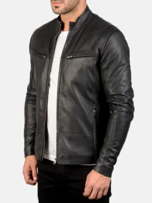 Angled front view of black leather jacket worn by male model with zip open